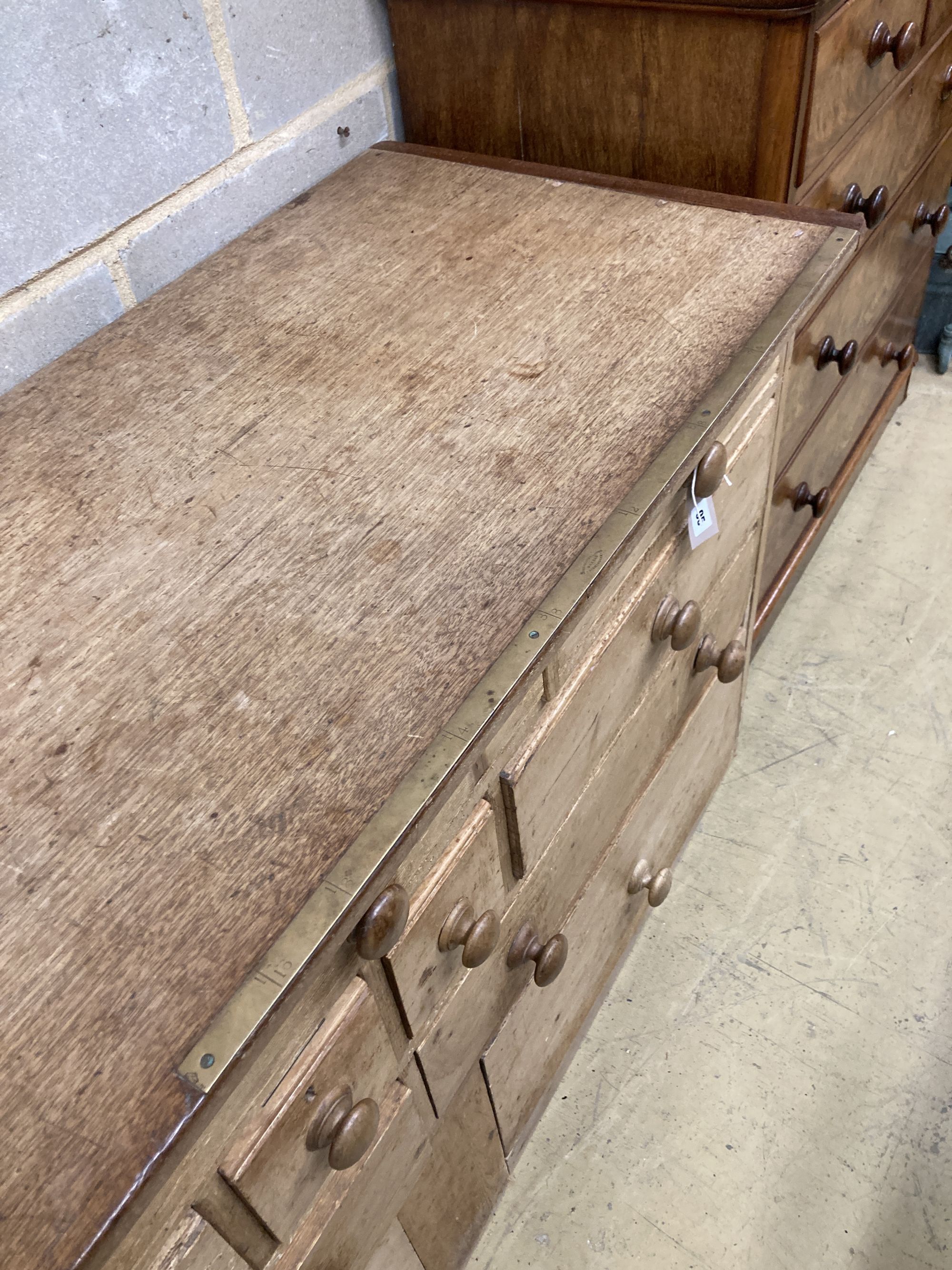 A Victorian pine haberdashery counter, length 232cm, depth 58cm, height 85cm